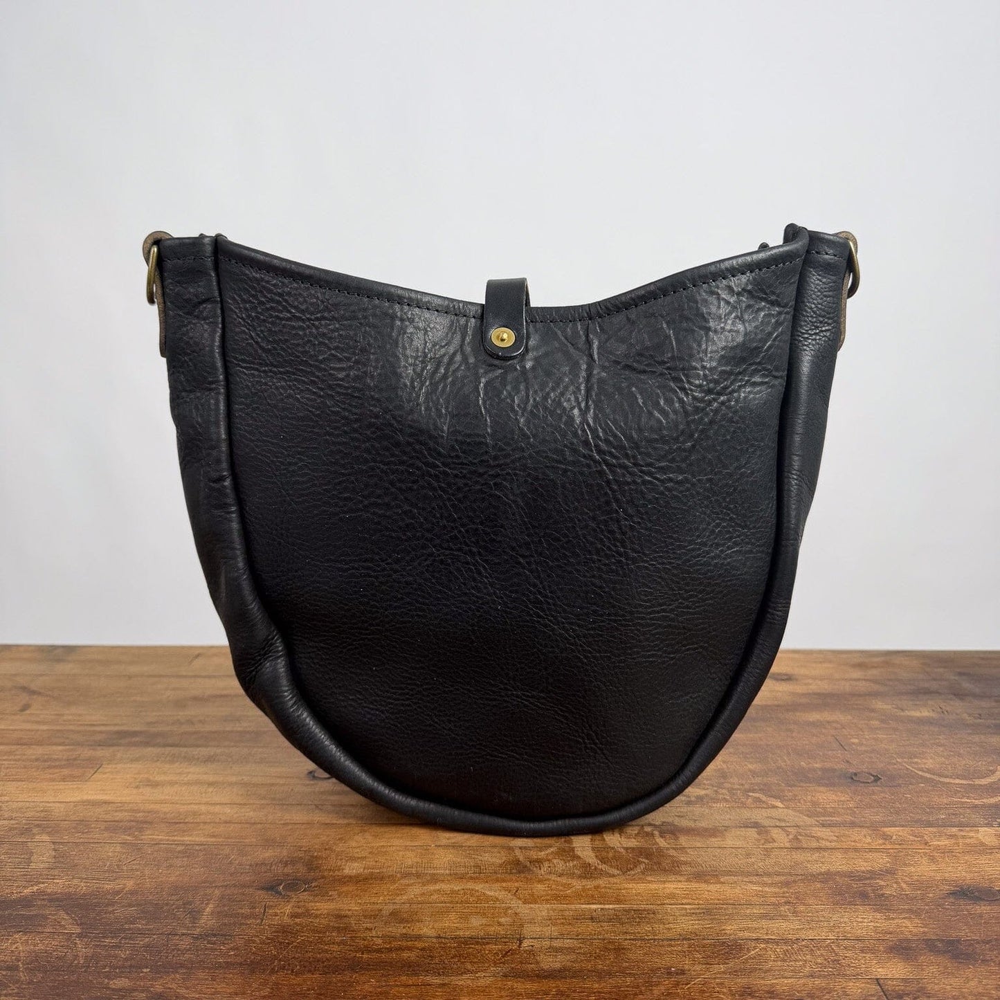 CELESTE LEATHER HOBO BAG - BLACK BISON - BUTTON STUD IS NOT ALIGNED - NEARLY PERFECT - IN STOCK