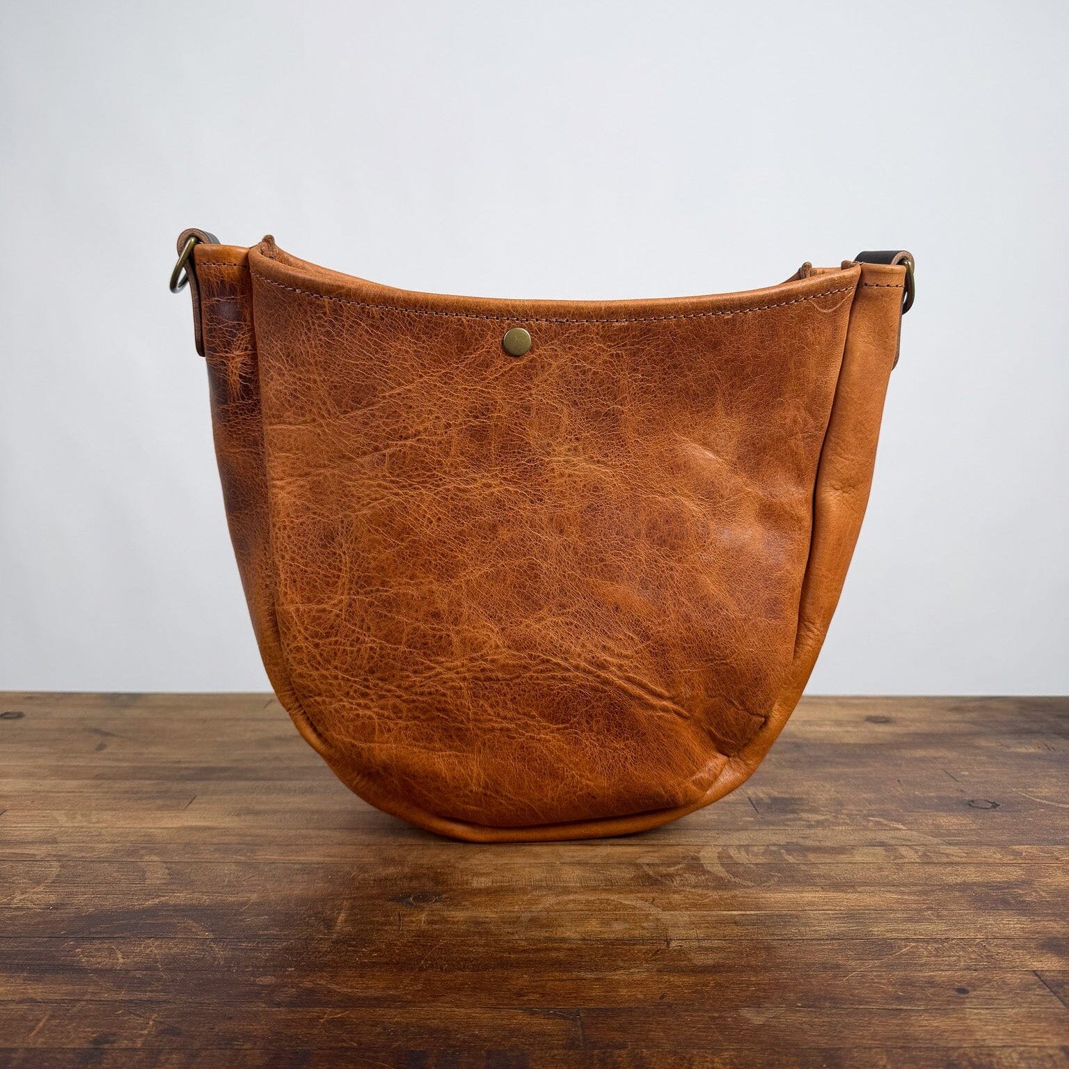 CELESTE LEATHER HOBO BAG - PEANUT BISON - SNAP IS NOT ALIGNED