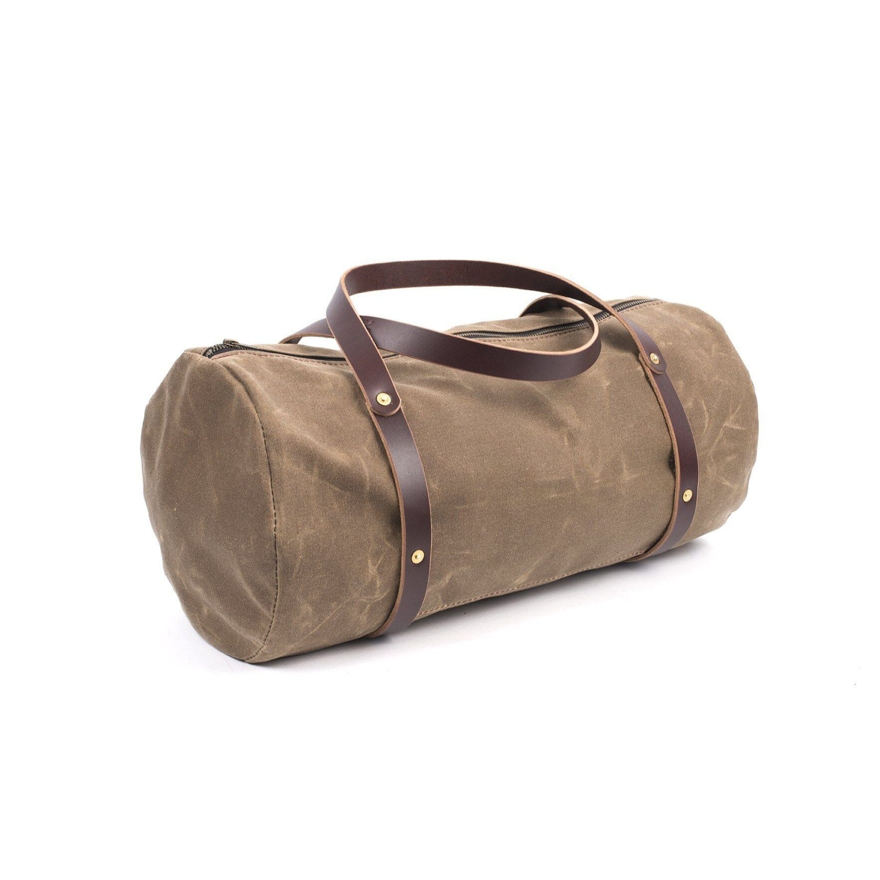 canvas weekend travel duffel bag Go Forth Goods William Waxed Canvas Weekender Duffle Bag Field Tan
