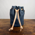 LEATHER BUCKET BAG - MEDIUM - SMOKEY BLUE - NATURAL STRAPS - WATER DAMAGE IN SHIPMENT - NEARLY PERFECT - IN STOCK