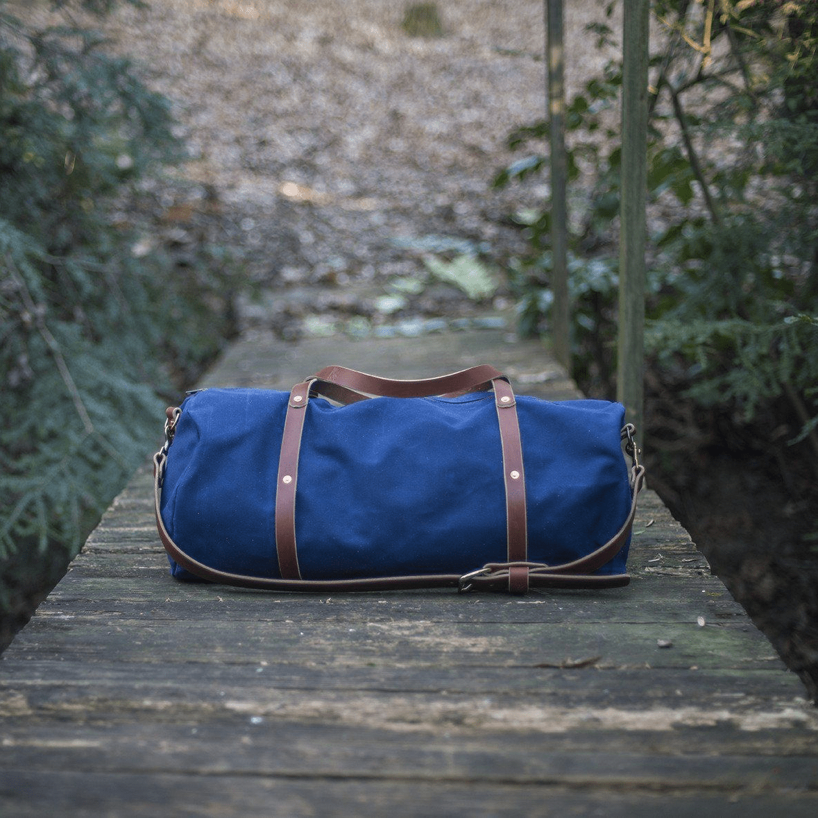 WILLIAM WAXED CANVAS DUFFLE BAG