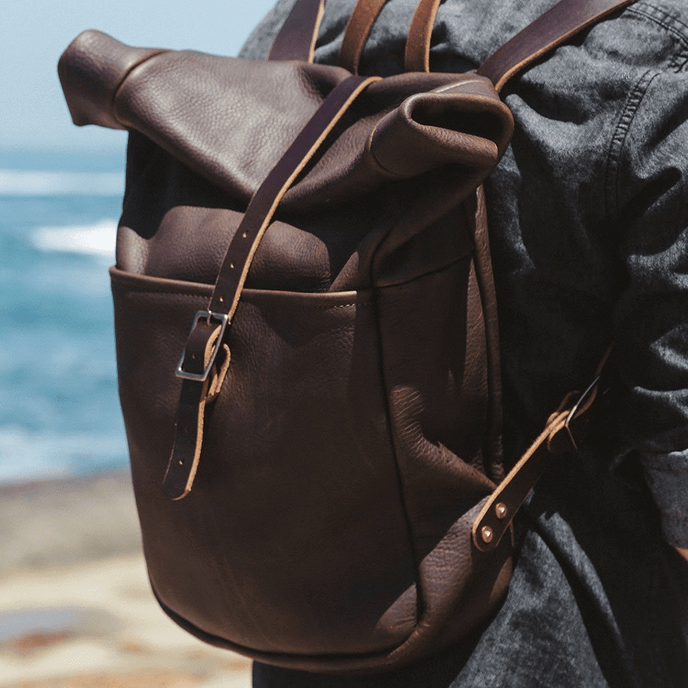 brown leather roll top backpack Go Forth Goods Grant Leather Roll Top Rucksack Backpack