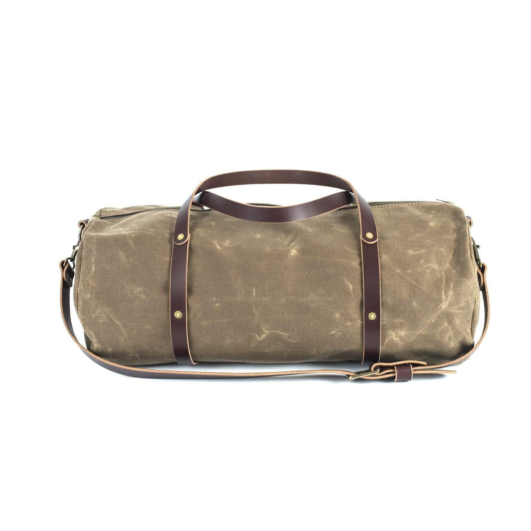 canvas leather travel duffel bag Go Forth Goods William Waxed Canvas Duffle Bag Field Tan